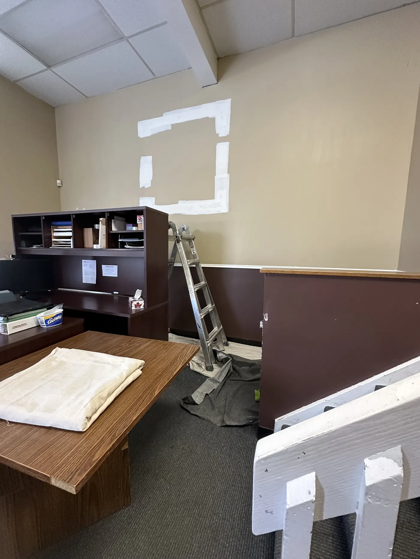 Office space mid-project with All In One Painting crew working efficiently